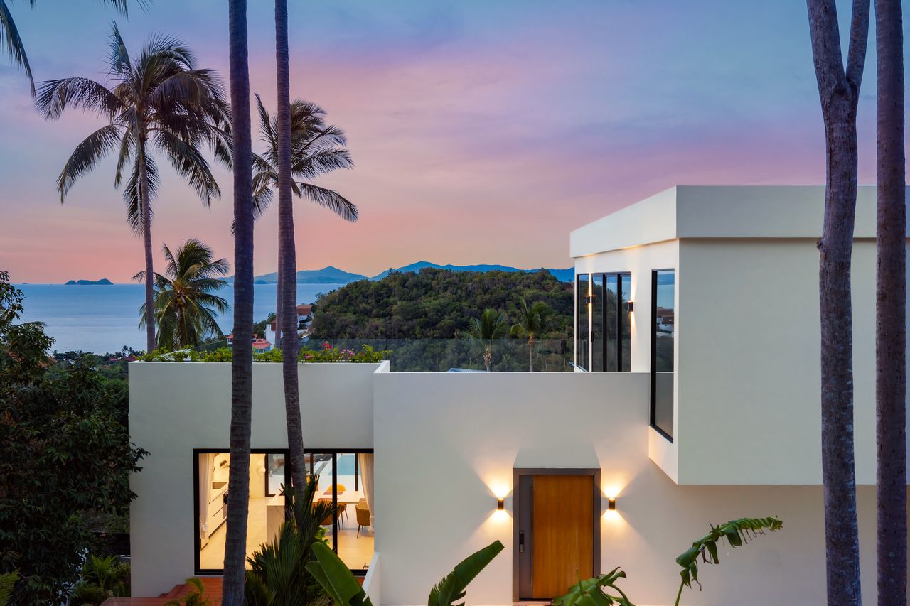 The villa and the sea at sunset